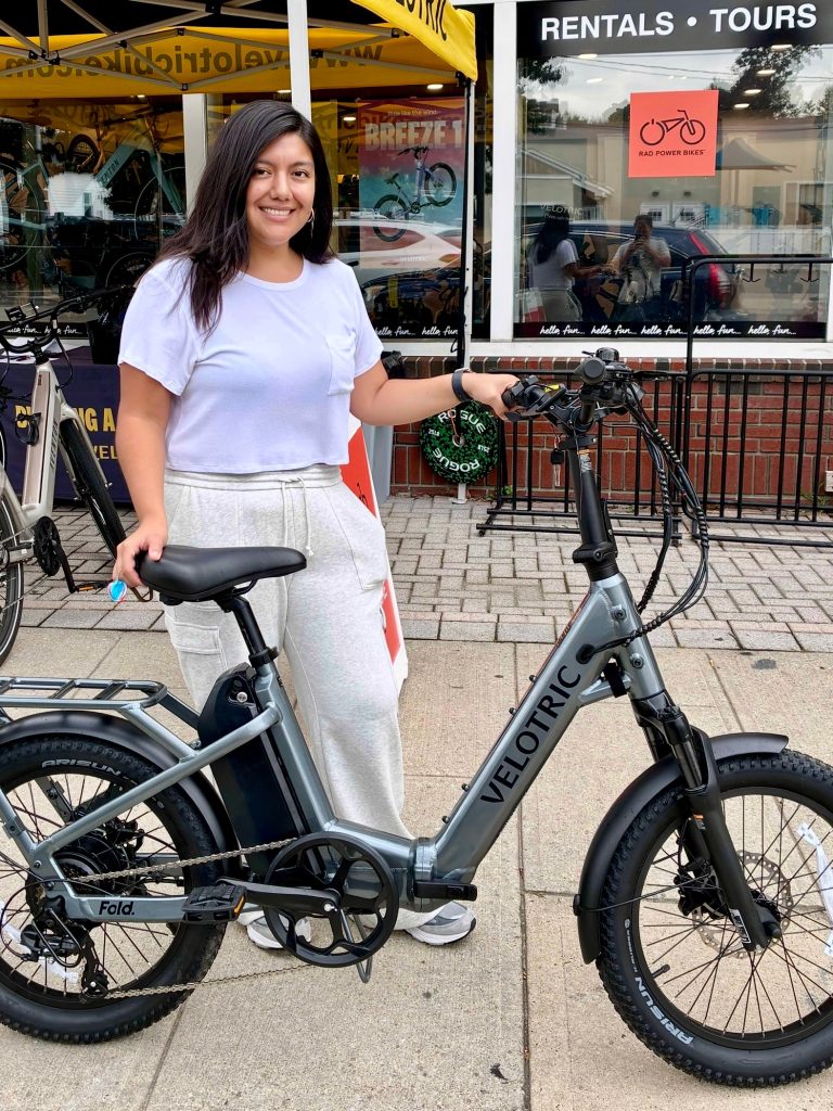 E-bike Incentive Program Recipient with their bike