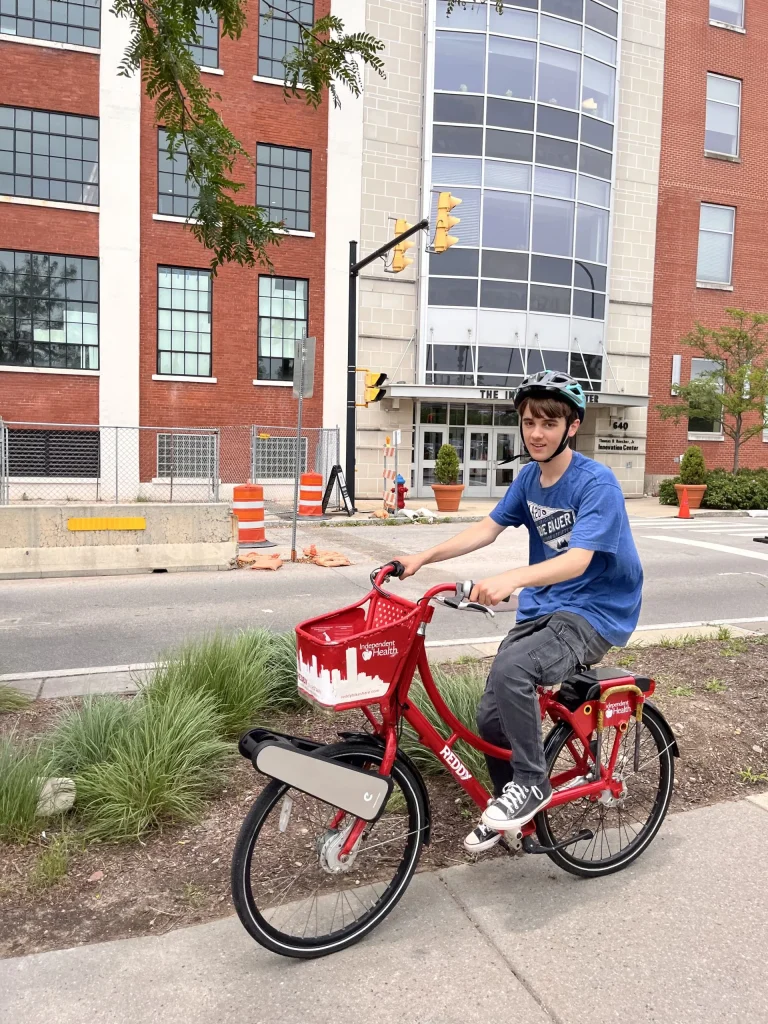 SMI Cornell Highroad Fellow, Jessie trying the Clip on a Reddy Bike