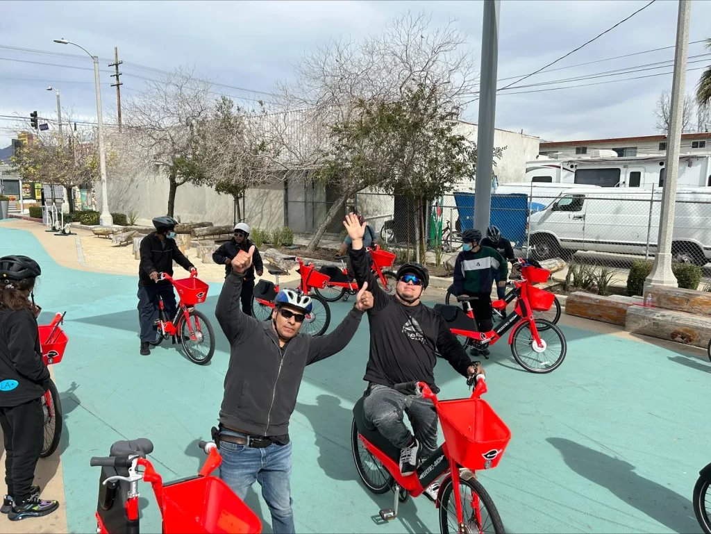 E-Bike riders assembling for the beginning of a group bike ride in Pacoima, Los Angeles