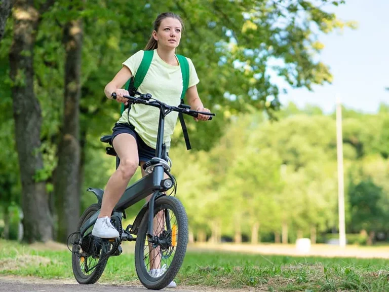 Young woman riding an e-bike