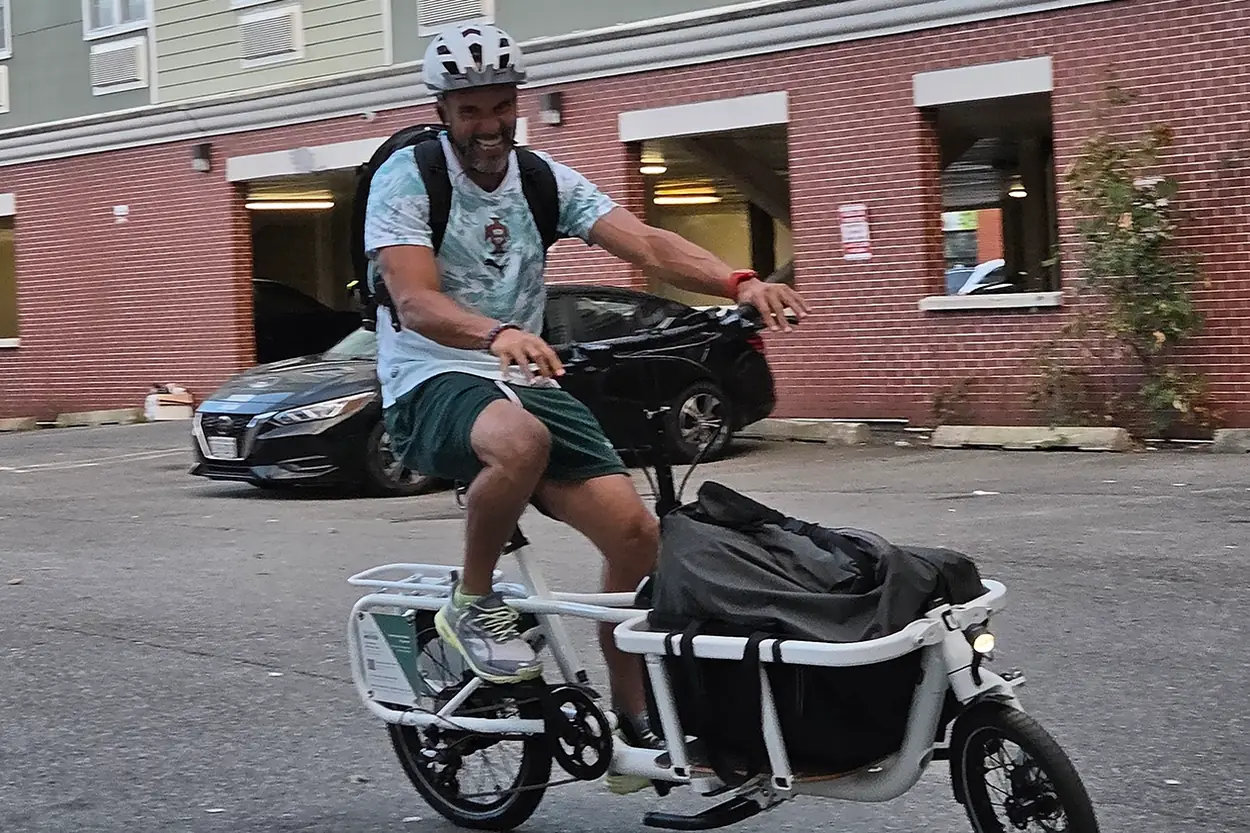 ebike owner in a parking lot
